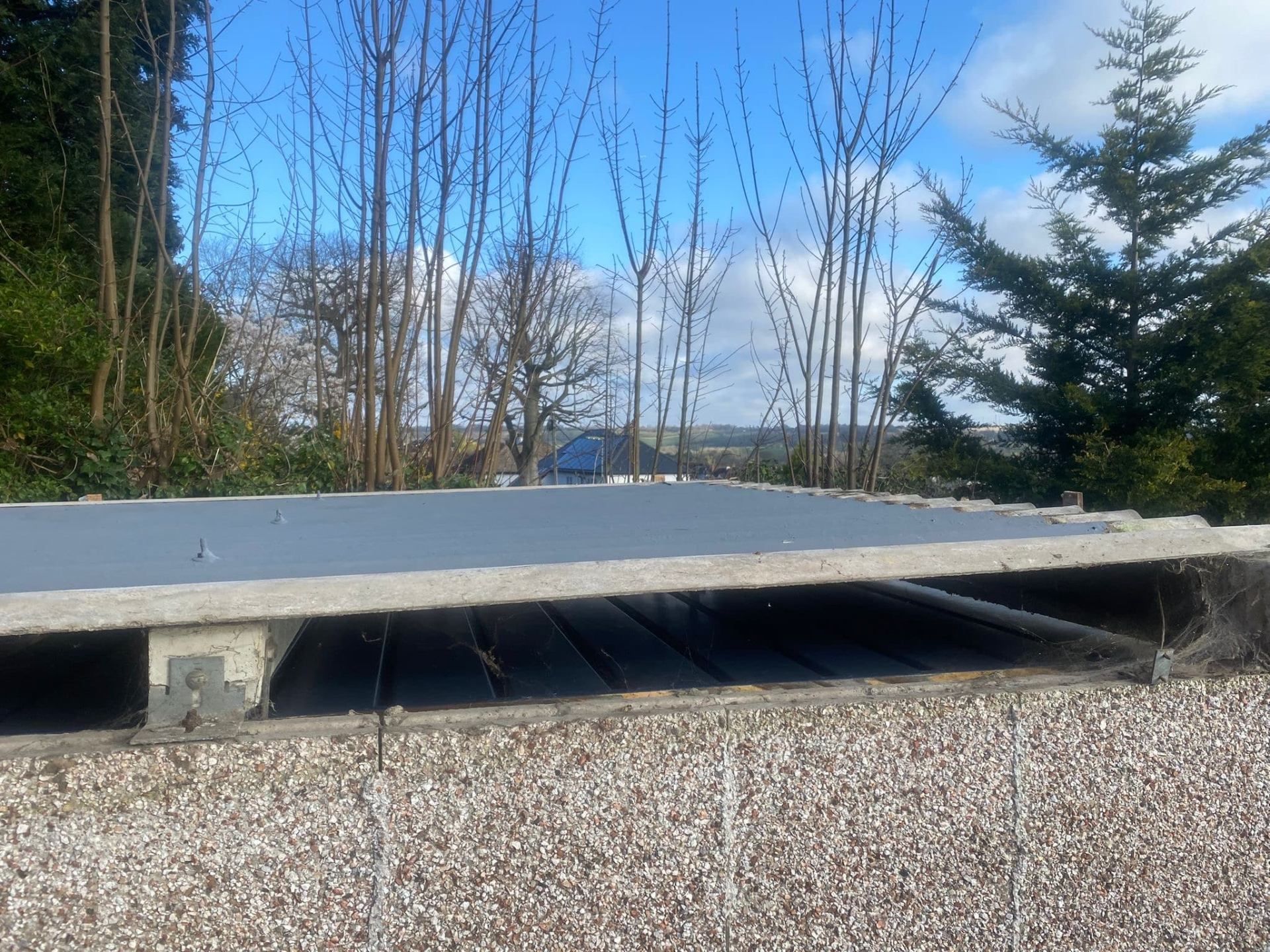 Asbestos Garage Removal in Guildford: The garage roof nobody thinks about