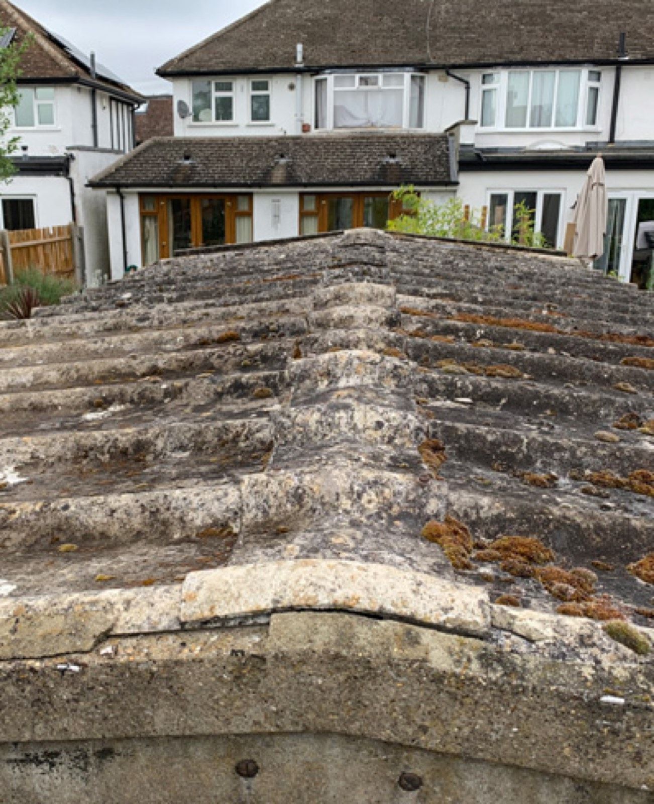 Asbestos Roofing Removal in Sutton: The cement roofs across Sutton's back gardens